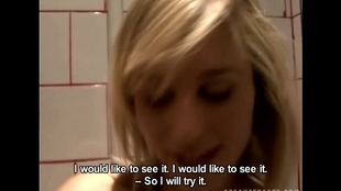 Ash-blonde chick does a deep blowjob in the toilet from behind