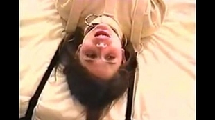 Pretty tiny teenage dark-haired peril in ball-gagged straight jacket 1